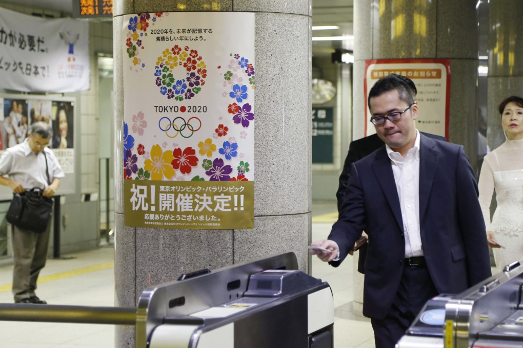 Passengers at a subway station in Tokyo. Photo: AP