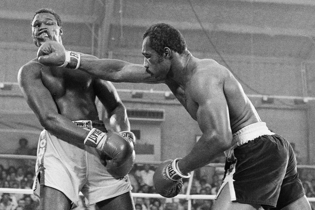 Ken Norton socks Larry Holmes in the jaw in a battle for the heavyweight championship at Caesars Palace in 1978. Holmes won the bout in a 15-round split decision. Photo: AP