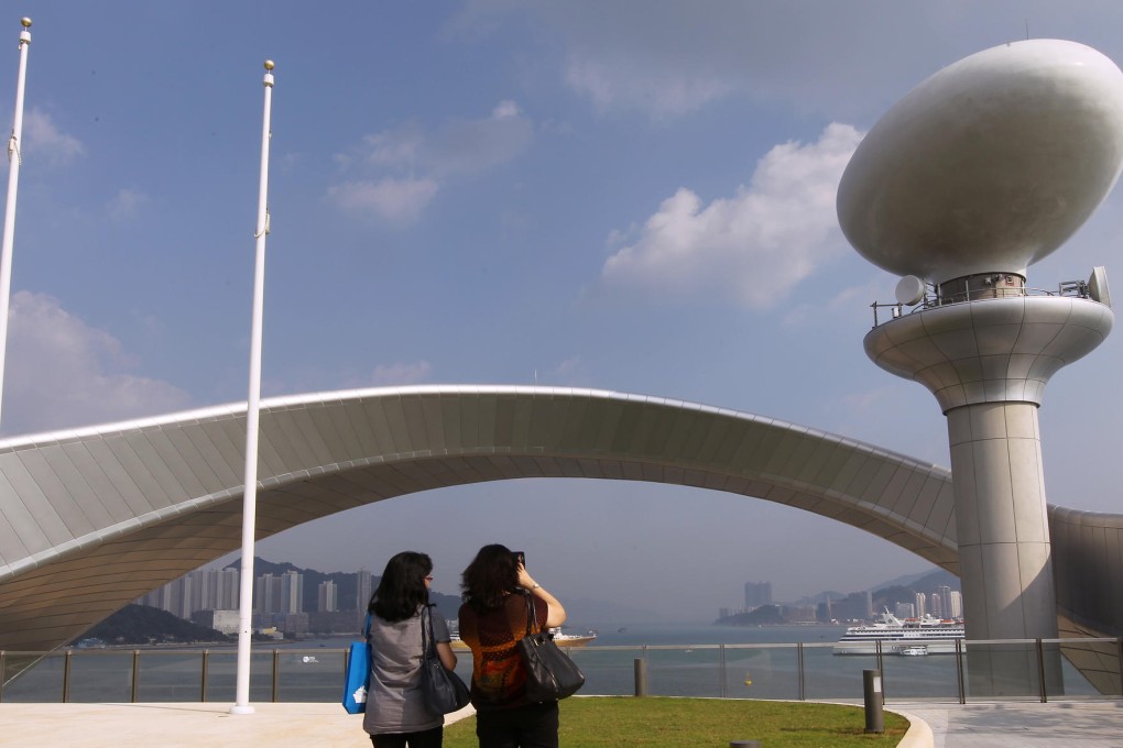 Visitors check out the view from the rooftop. Photo: Edward Wong