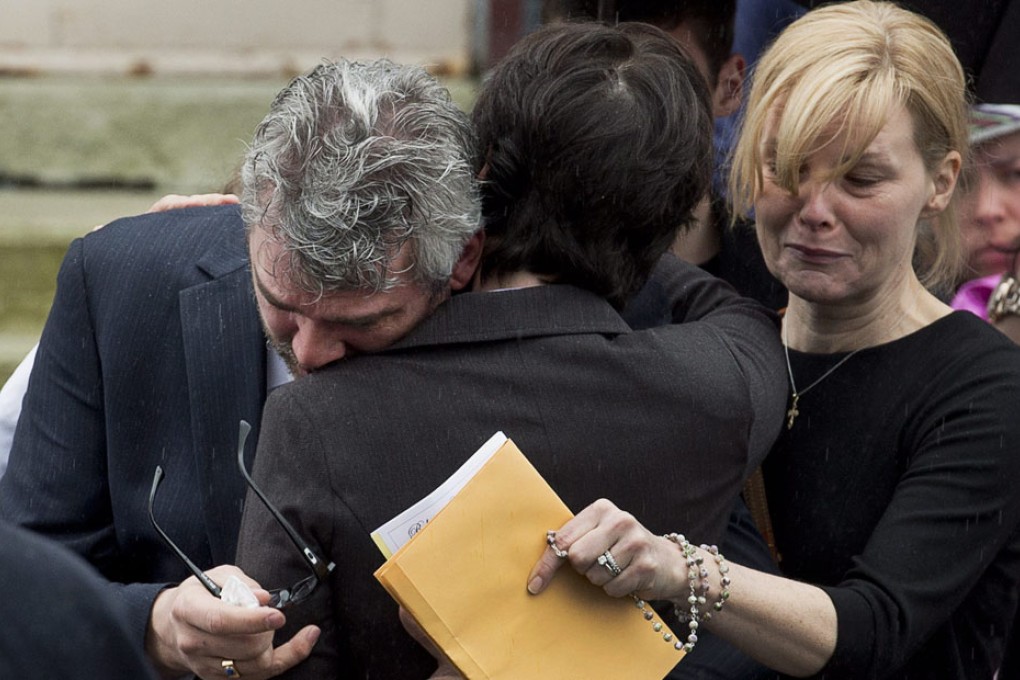 Glen Canning (left), father of Rehtaeh Parsons, at her funeral. Photo: AP