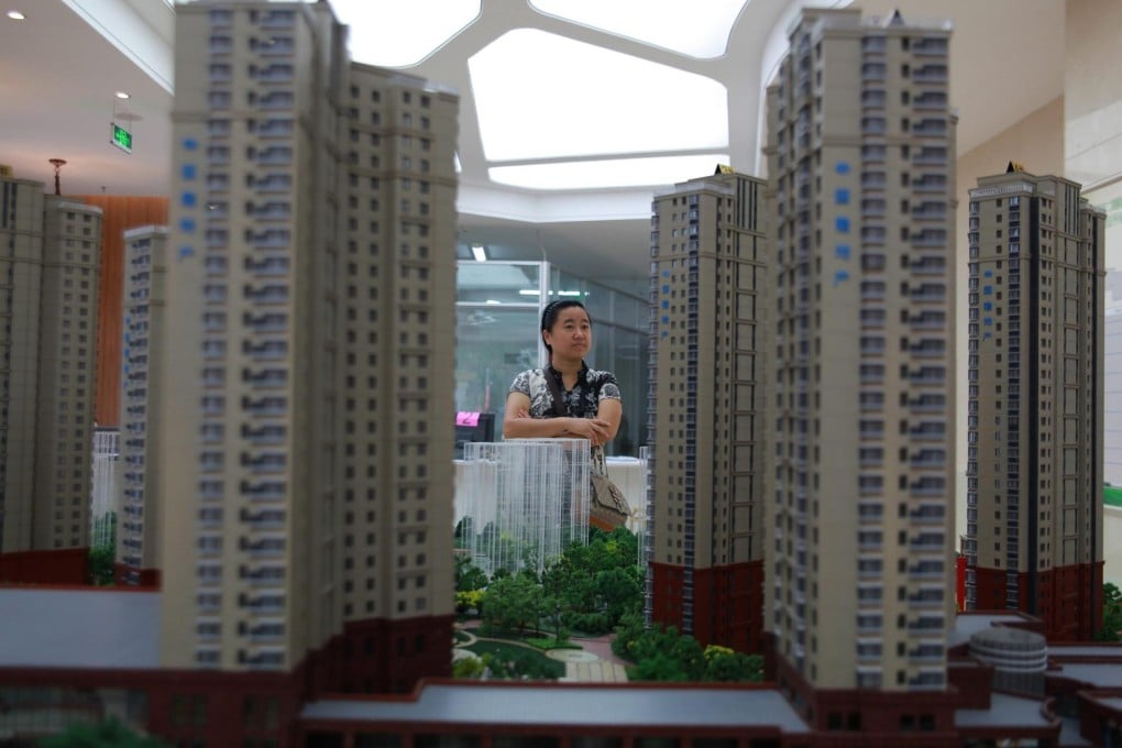 Mainland developers have turned more cautious about investing, leaving much of their money on their balance sheets. Photo: EPA