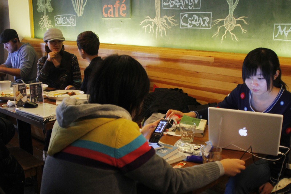 Microbloggers in Hong Kong could also fall under the mainland's new rules on internet rumours if Beijing considers their posts 'seriously prejudicial to national interests', legal experts warn. Photo: Graeme Nicol