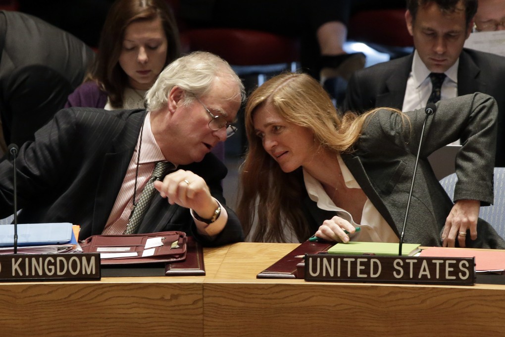 British Ambassador Mark Lyall Grant and U.S. Ambassador Samantha Power (right) confer in the United Nations Security Council. Photo: AP