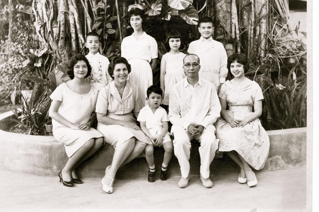 Marcial Lichauco and his wife Jessie Coe, with Nelly Fung sitting front row on her mother's left.