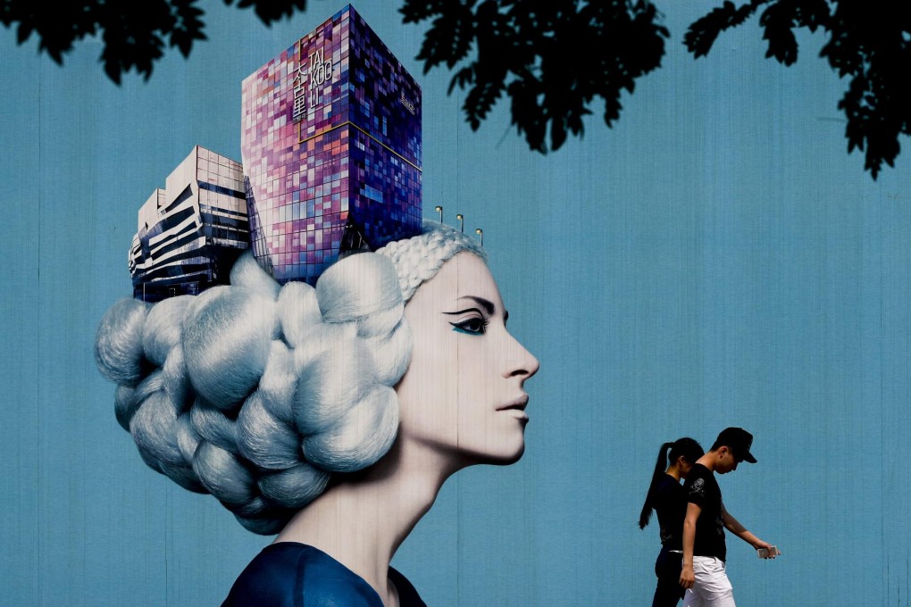 Mainlanders are swamped with advertising for new flats but the prices are now beyond the reach of ordinary workers. Photo: EPA