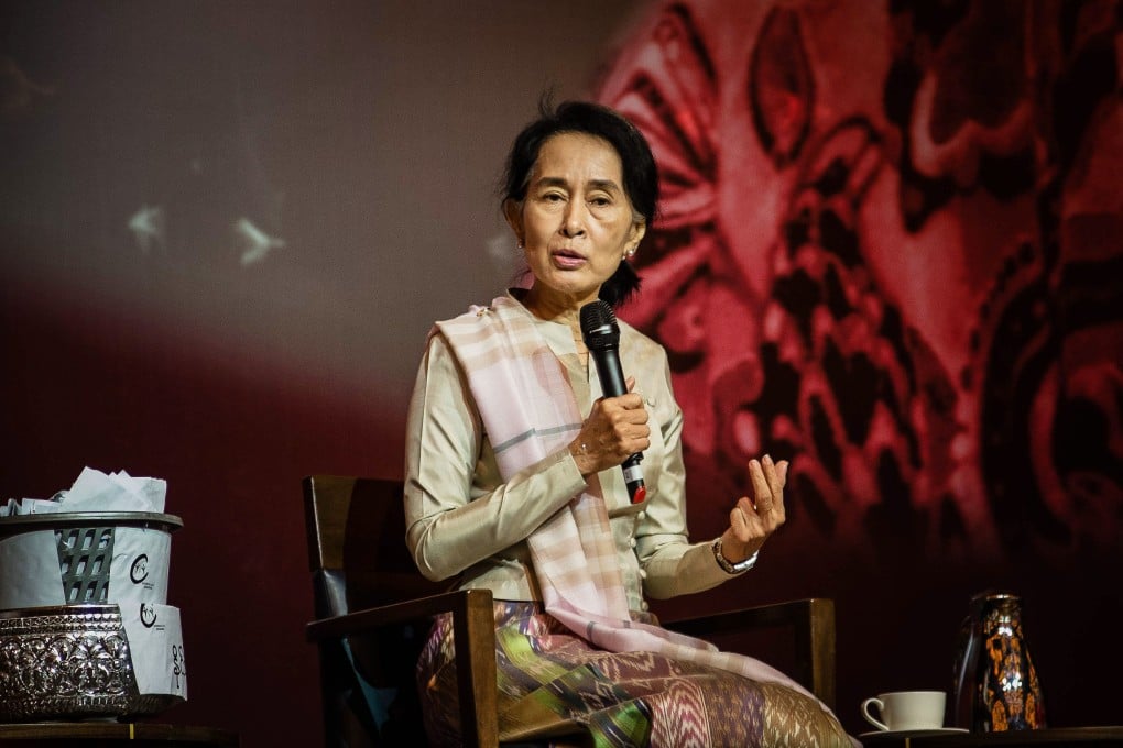 Myanmar opposition leader Aung San Suu Kyi addresses the Myanmar Club in Singapore on Sunday. Photo: EPA