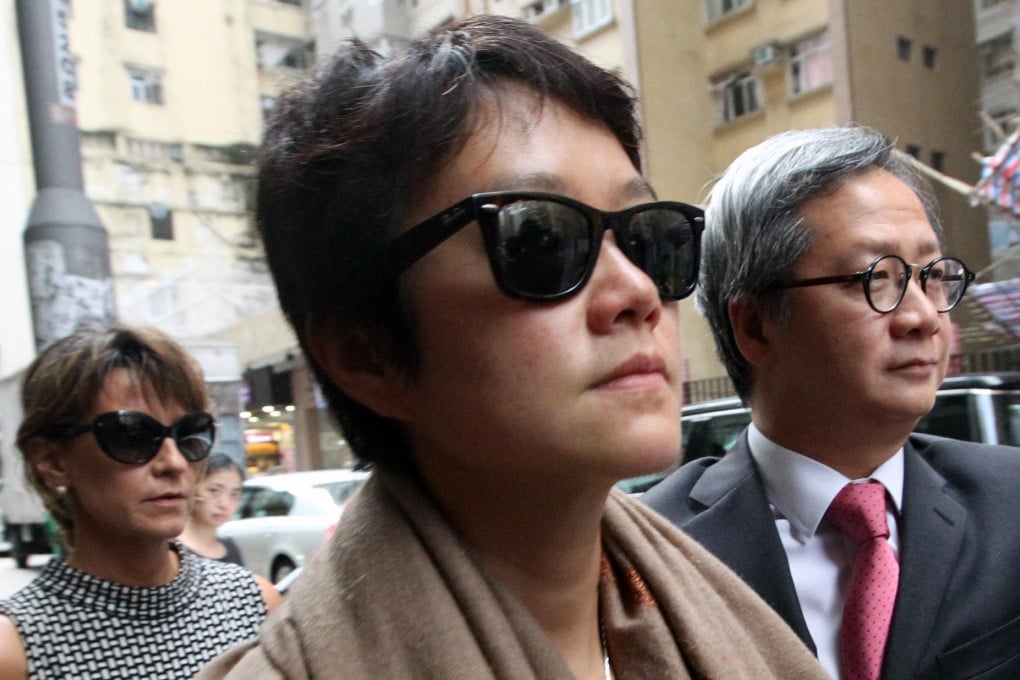 Relatives and friends of Wayne Hu, including his wife Emma Liu (centre), attended a ceremony for the late doctor yesterday. Photo: Felix Wong