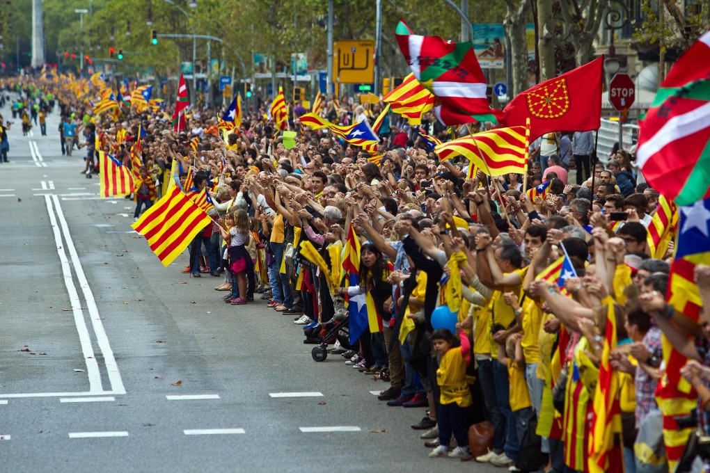 People form a human chain in Barcelona. Photo: AP