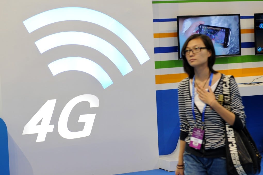 China is likely to issue 4G licenses in the first half of October, but teething problems will limit new sign-ups to 10-20 million in the first year of service. Photo: Xinhua