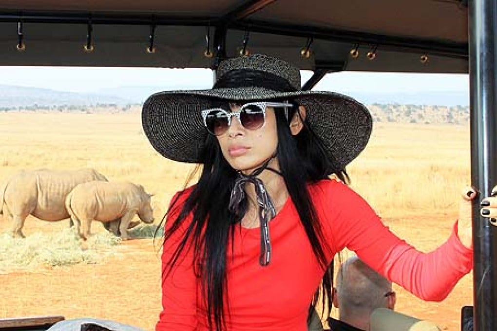 Actress Bai Ling visits the Entabeni game reserve in South Africa in a bid to dissuade Asians from buying rhino horns. Photo: AFP