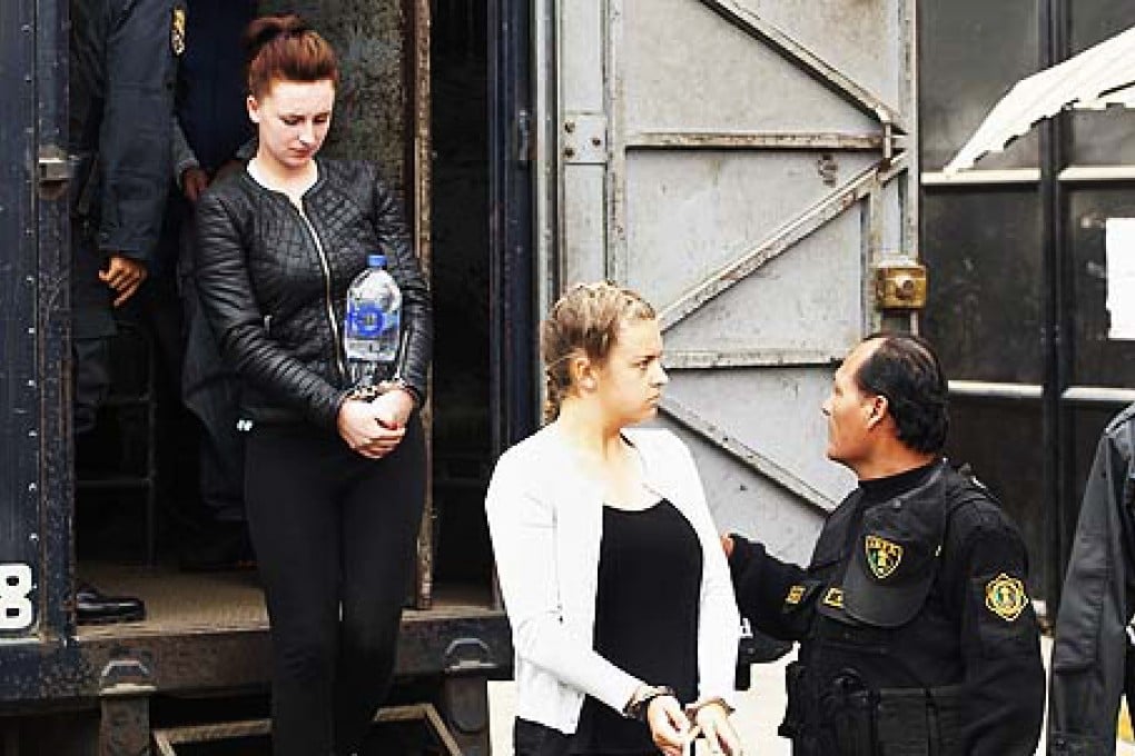 Michaella McCollum and Melissa Reid arrive in Callao. Photo: Reuters