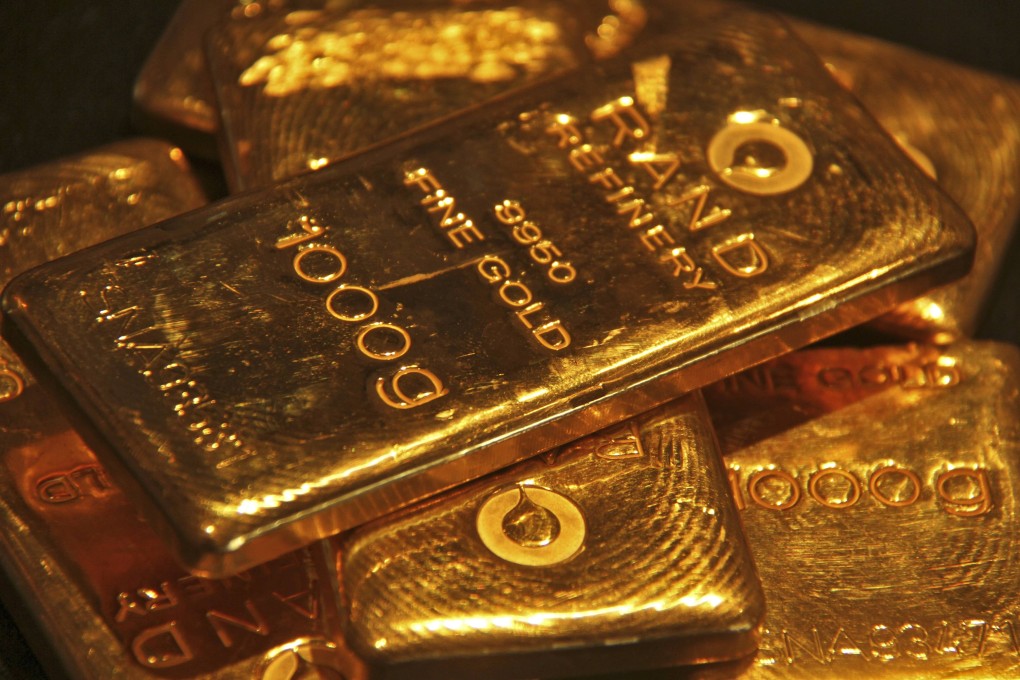 Gold rose four per cent immediately after the Fed’s surprise announcement that it was not tapering its bond buying, spurring an official probe. Photo: Reuters