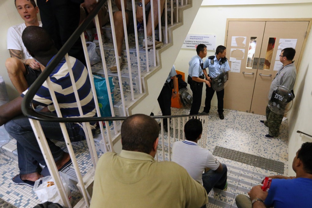 Asylum seekers clashed with police in August after the International Social Service Hong Kong Branch refused to meet them. Photo: Felix Wong
