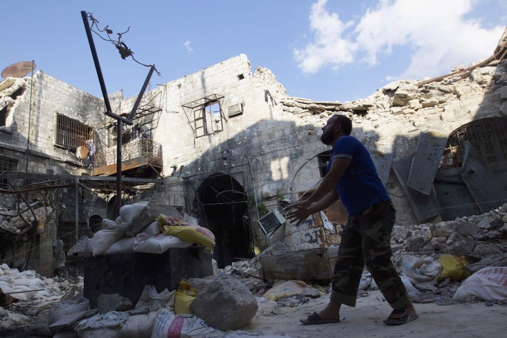 A Free Syrian Army fighter in Old Aleppo. Photo: Reuters