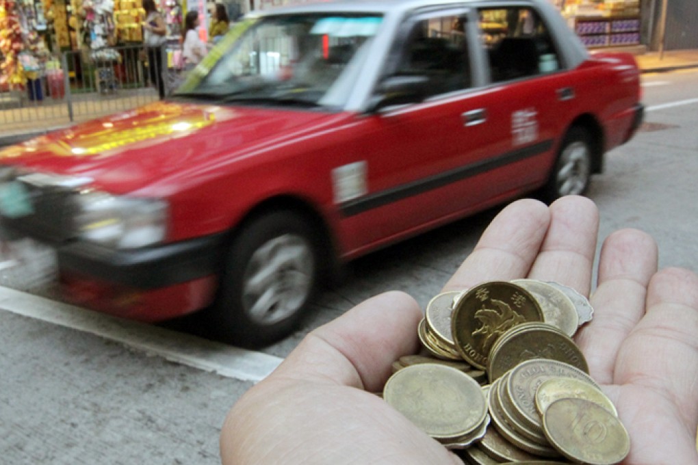 Taxi passengers will pay HK$2 more on flag fall and an extra 10 cents every 200 metres from December. Photo: K. Y. Cheng