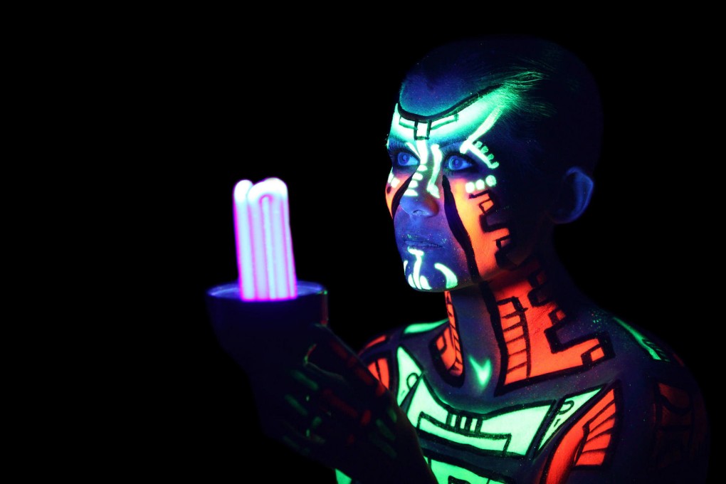 UV body painting: your taxi driver may be less than impressed. Photo: Shutterstock