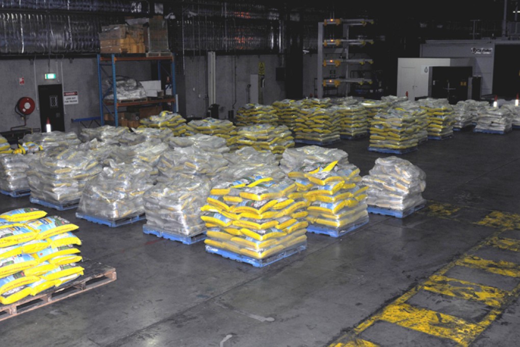 Pallets of rice in a warehouse which contained ephedrine and were uncovered during a pest check on the shipment after it arrived in Melbourne from India. Photo: AFP