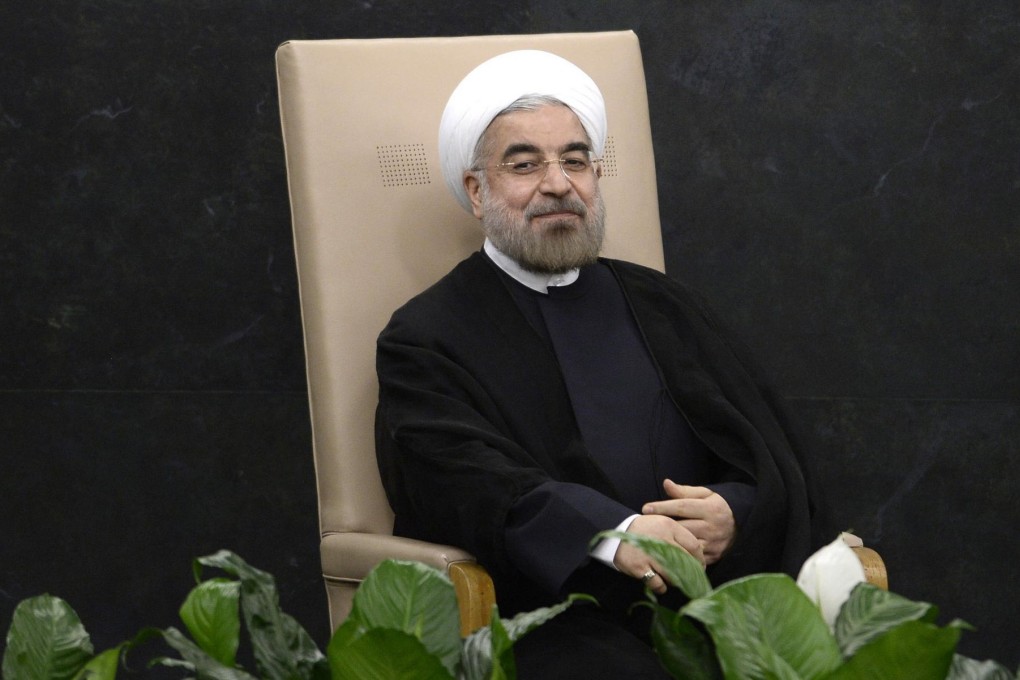 Iranian President Hassan Rowhani waits for his turn at the podium at the United Nations General Assembly. Photo: EPA