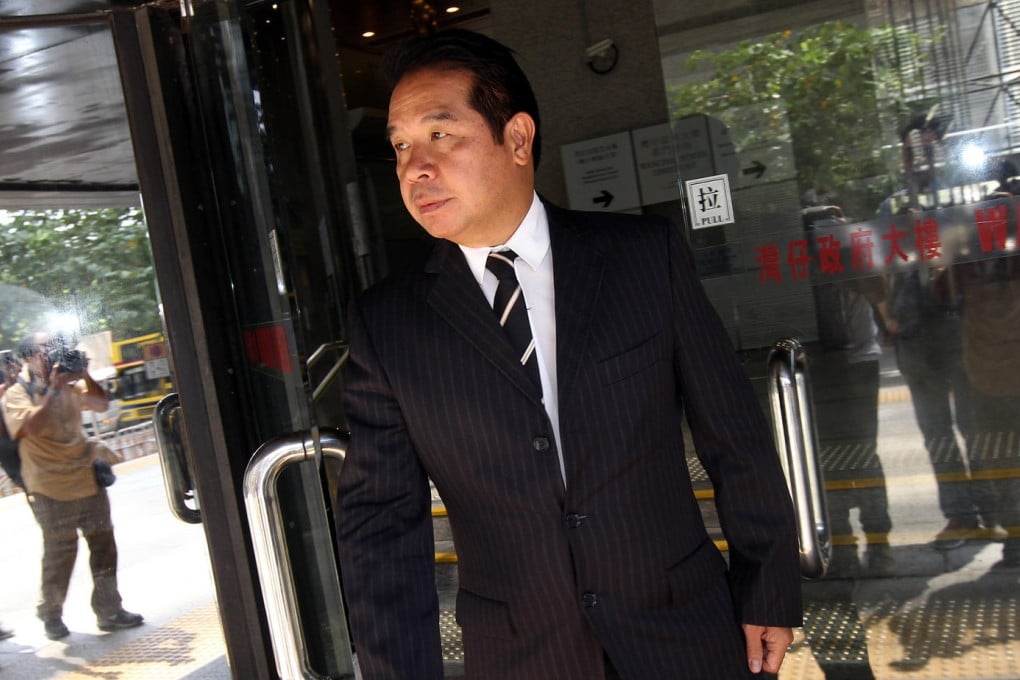 Carson Yeung leaves the District Court in Wan Chai yesterday. He is accused of dealing in HK$721 million of ill-gotten gains. Photo: David Wong