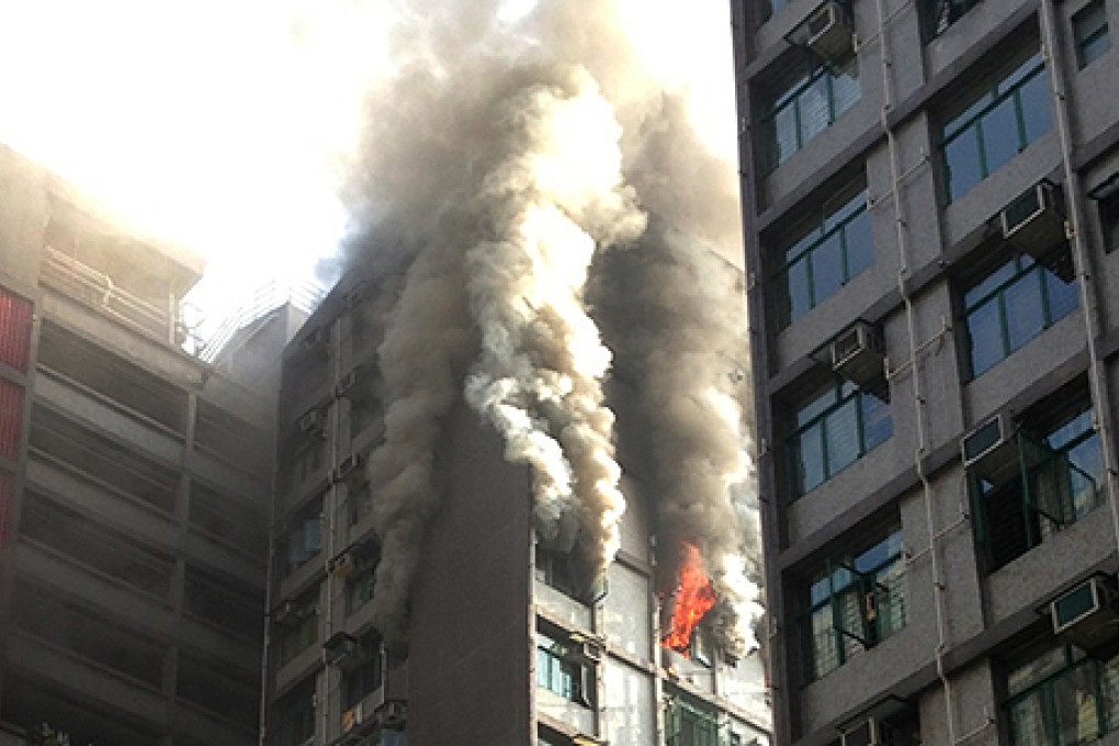 The fire on the 14th floor flat at Wang Fu House in Wang Tau Hom Estate that sent 200 residents fleeing on Thursday. Photo: SCMP Pictures