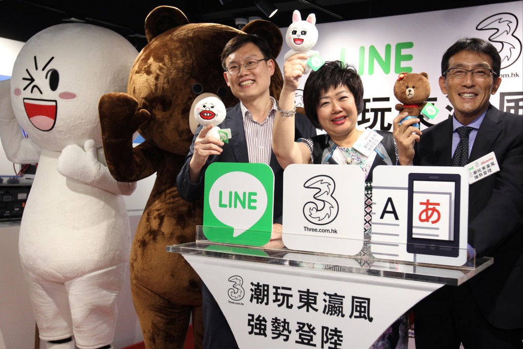 Katsuyuki Takagi of NTT DoCoMo (right), with Kang Hyun-bin of Line and Amy Lung of Hutchison Telecommunications at yesterday's launch of their collaboration in Causeway Bay. Photo: Dickson Lee