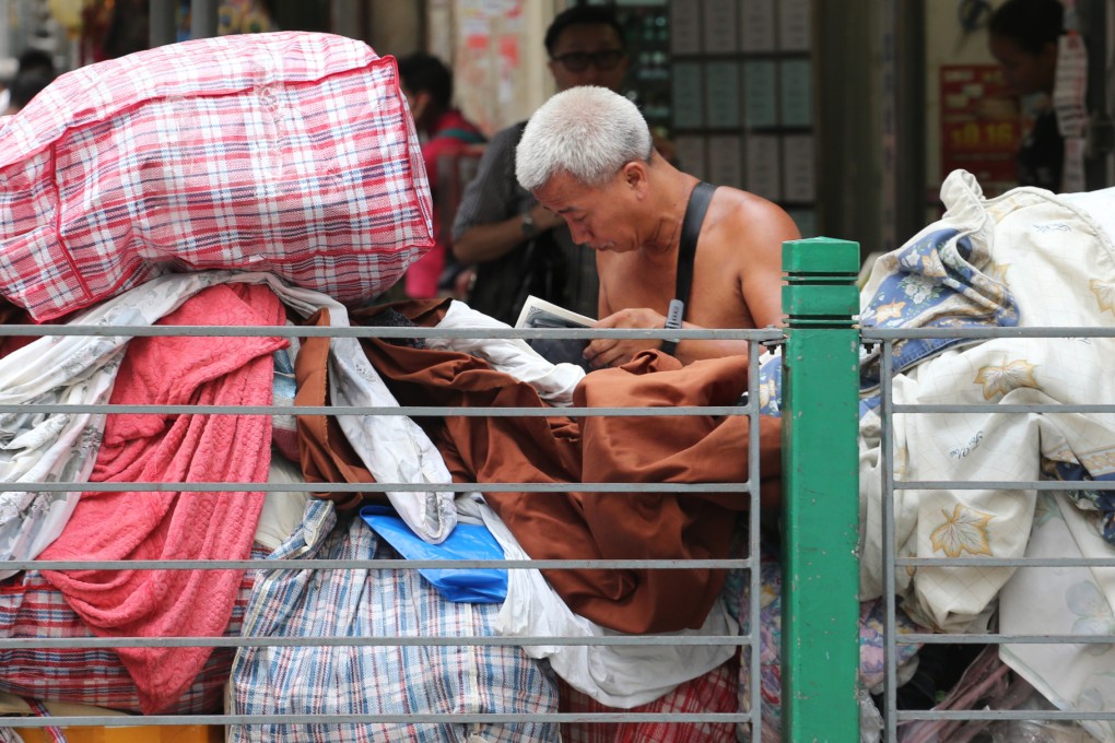 A man scavenges in Sham Shui Po. Photo: Felix Wong