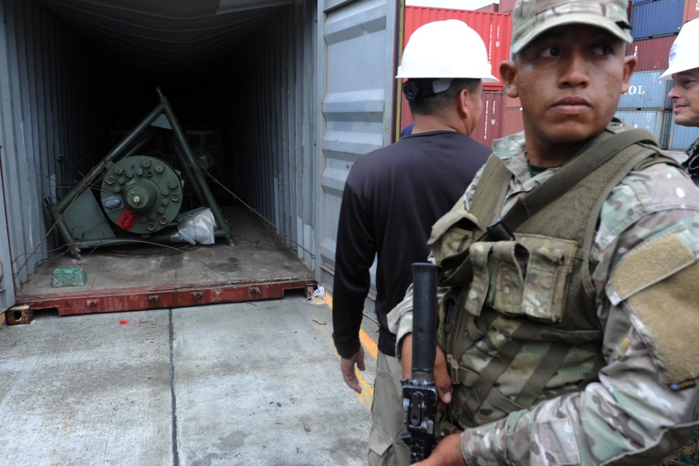 A Panamanian soldier stands guard near a container of the North Korean Chong Chon Gang vessel. Photo: AFP