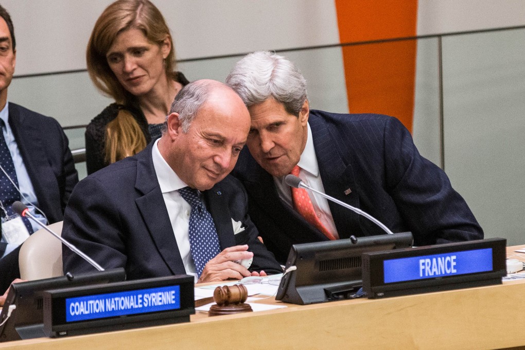 US Secretary of State John Kerry (right) and French Foreign Minister Laurent Fabius attend a Friends of the Syrian People meeting on the sidelines of the 68th United Nations General Assembly in New York. Photo: AFP