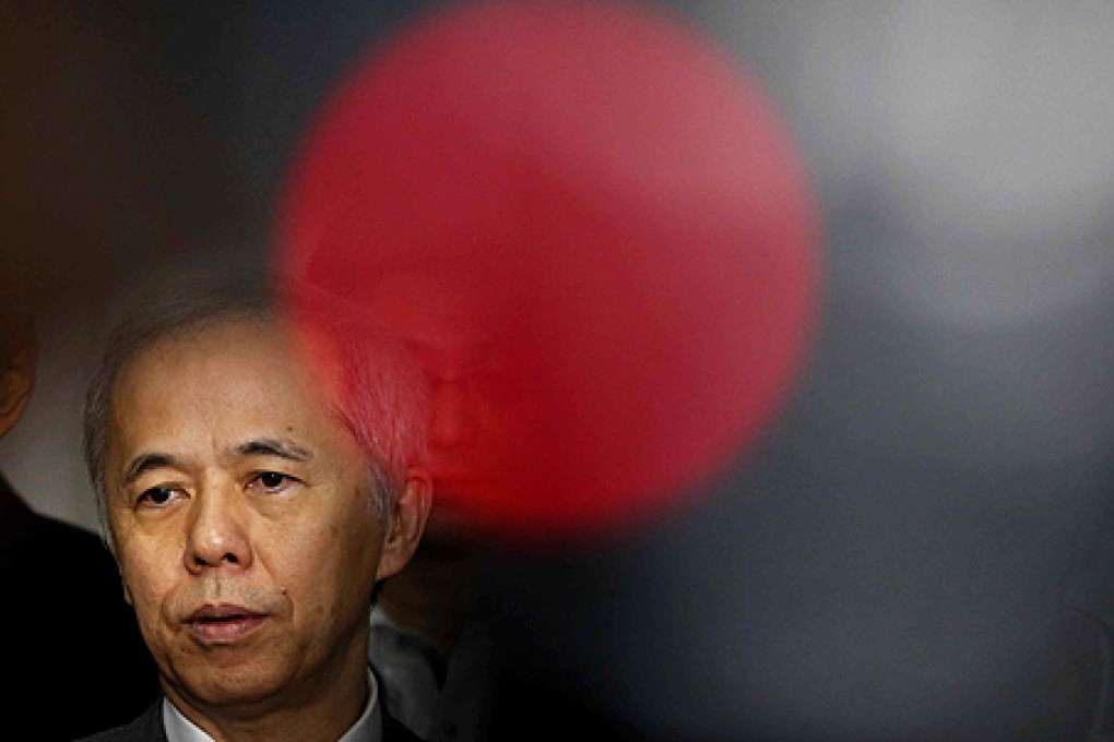 Tepco president Naomi Hirose, the operator of tsunami-crippled Fukushima Daiichi plant, speaks to the media in Tokyo on Friday. Photo: Reuters