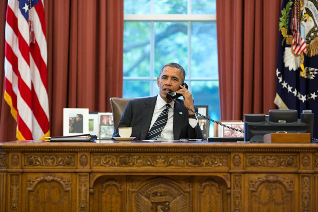 US President Barack Obama speaking directly with his Iranian counterpart Hassan Rowhani by phone in Washington D.C. Photo: Xinhua