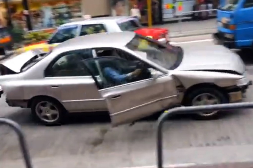 The driver pictured on video after crashing into a minibus.