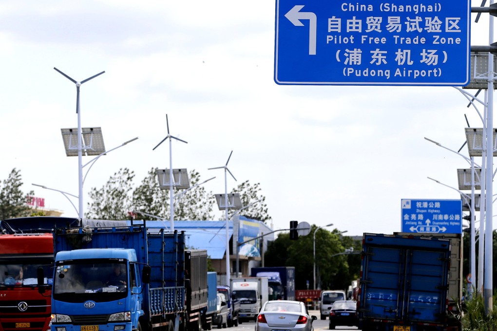Vehicles are seen near the Pudong Airport Comprehensive Free Trade Zone. Photo: Xinhua