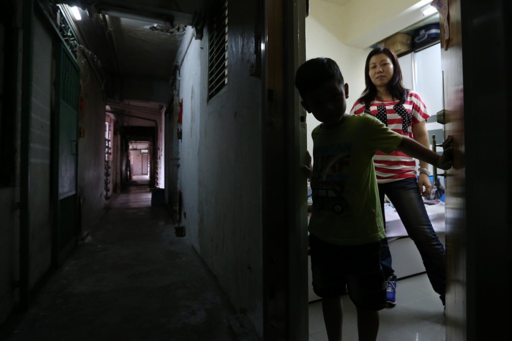 Like many poor, Tao Xiaorong and his mother live in a tiny room. Photo: Felix Wong