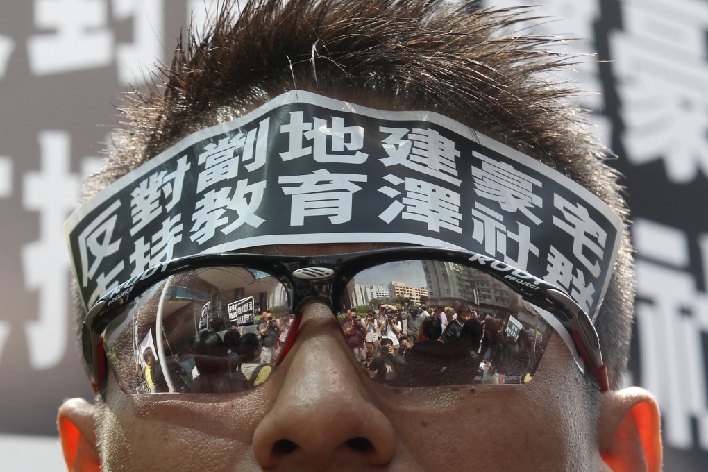 Protestor from Baptist University calling the government to return the vacated site of the Institute of Vocational Education (Lee Wai Lee). Photo: Edward Wong