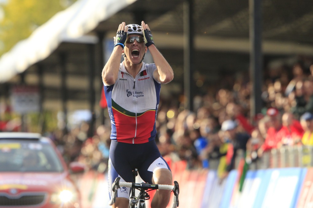 Rui Costa is overcome with joy after crossing the finish line. Photo: AFP