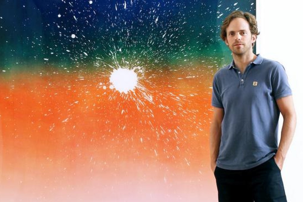 Florian Maier-Aichen with one of his heavily tweaked "photographs" at the Gagosian Gallery in Central. Photo: Edward Wong