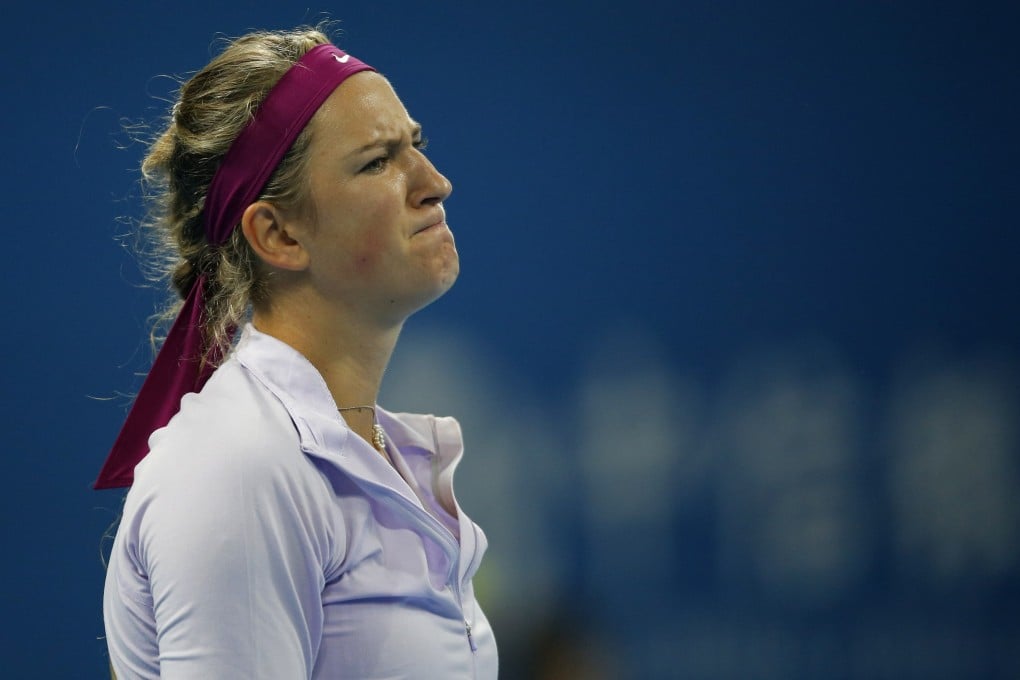 Victoria Azarenka of Belarus reacts after losing a point against Andrea Petkovic in their China Open match. Photo: Reuters