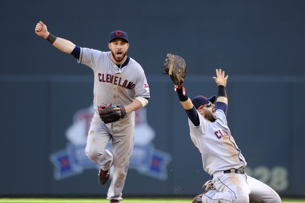 Jason Kipnis and Nick Swisher of the Cleveland Indians celebrate the 5-1 win against the Minnesota Twins. Photo: AFP