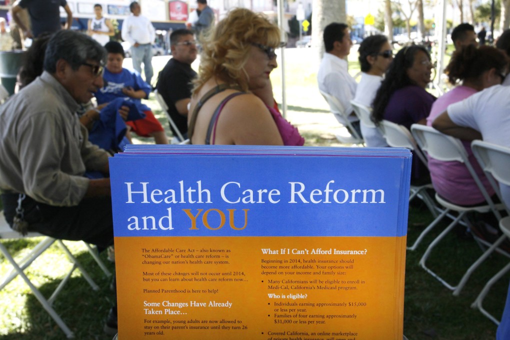 People gather for information during a Planned Parenthood Affordable Care Act outreach event for the Latino community in Los Angeles. Photo: Reuters