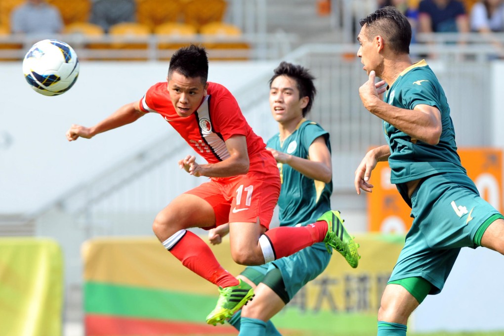 Chan Pak-hang opens the scoring for Hong Kong with a header as the hosts beat Macau 3-0 in the Interport Cup. Photo: Xinhua