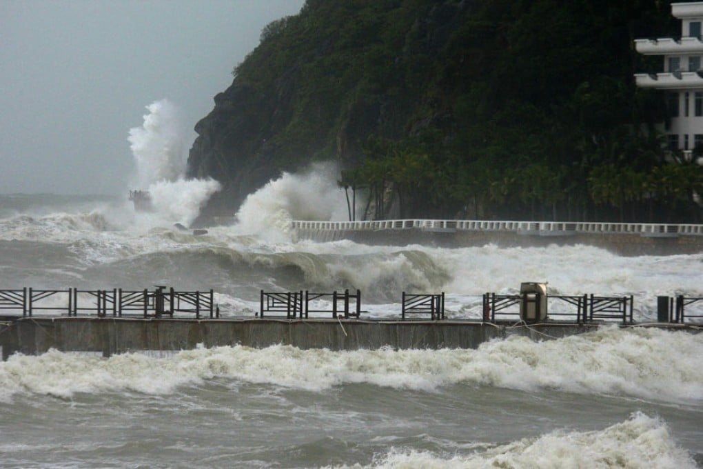 Big waves pound the coastline at Sanya, Hainan, yesterday as Typhoon Wutip moved towards the Vietnamese coast. Photo: China Foto Press