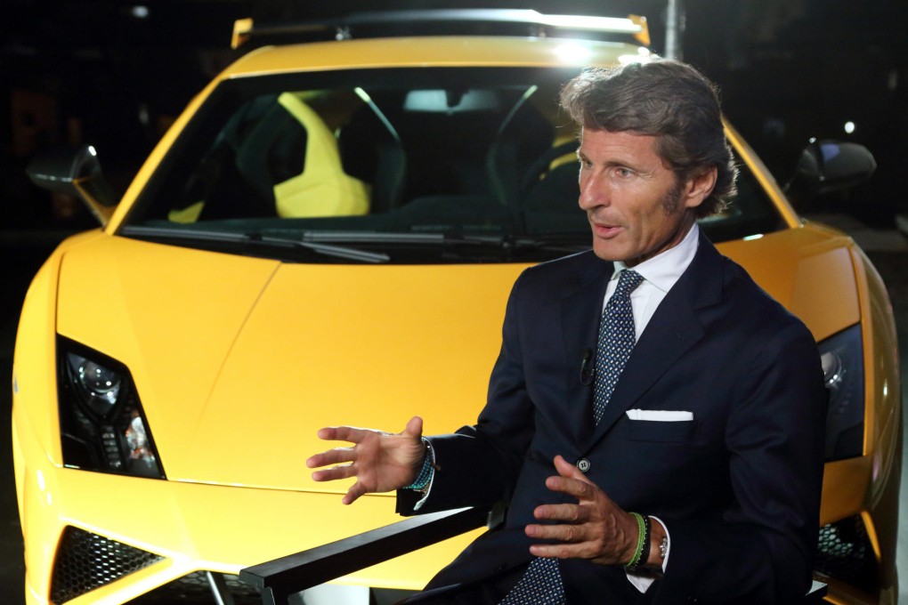 Lamborghini's Stephan Winkelmann, with the Gallardo LP 570-4 Squadra Corse, is seeing brisk sales in traditional markets. Photo: Bloomberg