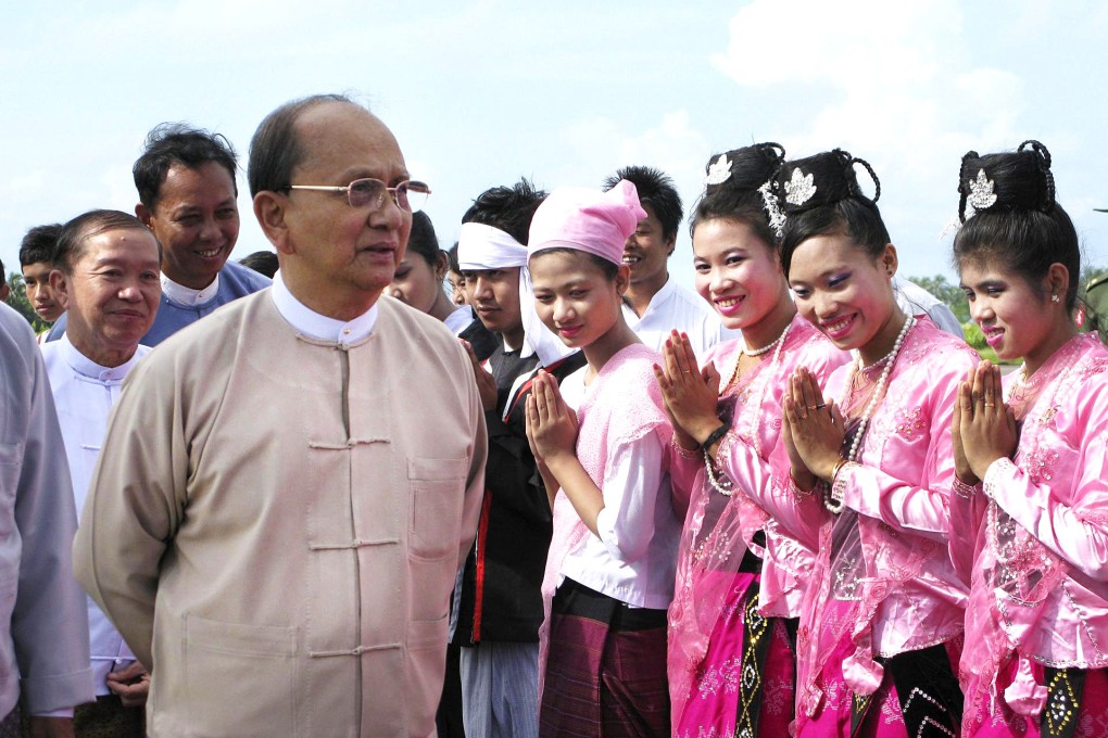 President Thein Sein is greeted as he arrives at Sittwe airport. He faces a tough time tackling the sectarian conflict. Photo: EPA