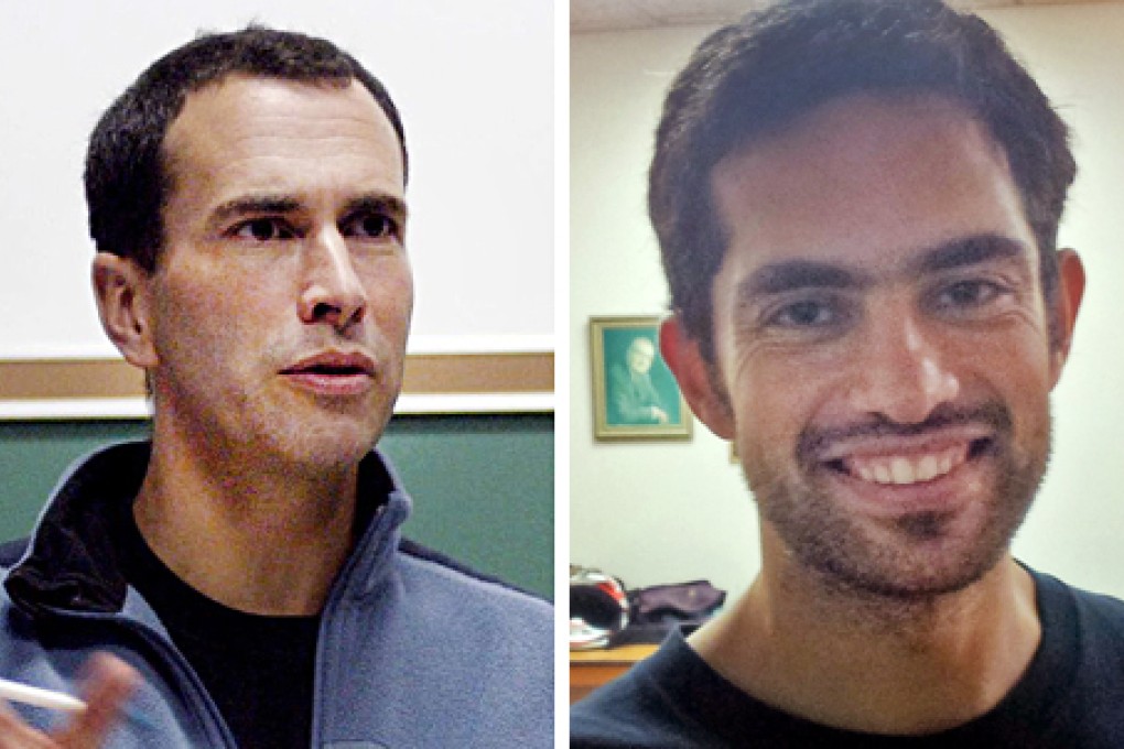 Tarek Loubani (right) and John Greyson have been held without charges since mid-August