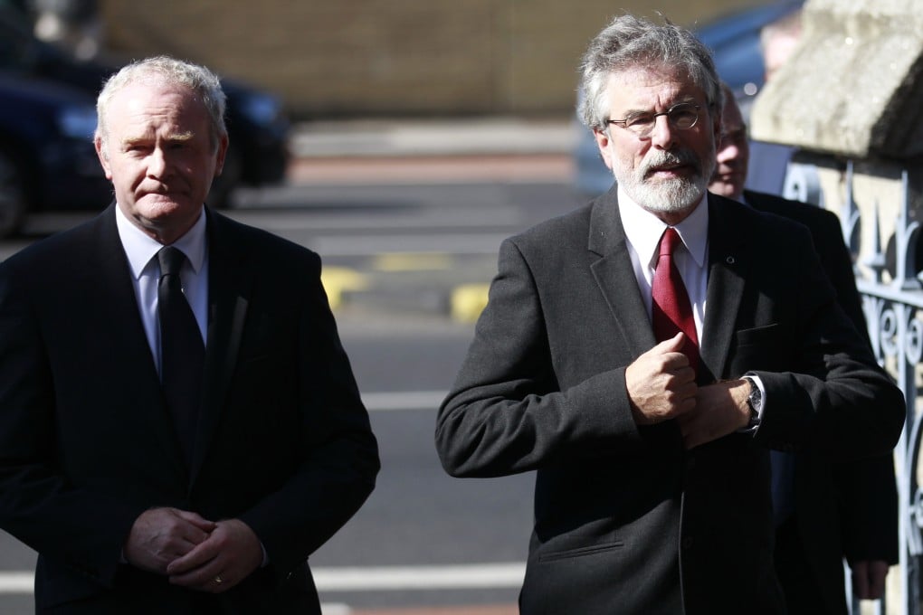 Gerry Adams (right and Sinn Fein's Martin McGuinness attend the funeral of Irish poet Seamus Heaney. Photo: AP
