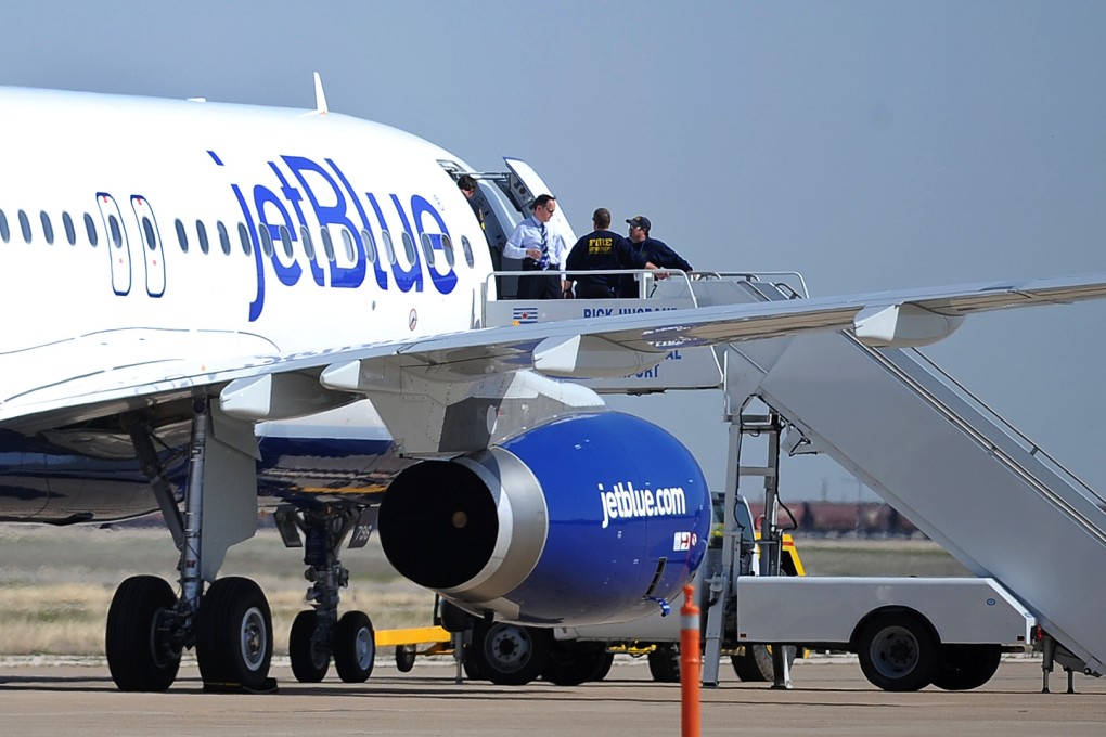 A JetBlue flight attendant smuggled heroin in her uniform.