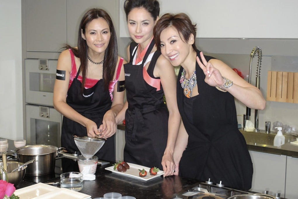 Getting set to prepare unique rose-flavoured desserts are Janet Ma, Ana Rivera and Lelia Chow. Photo: James Whittle