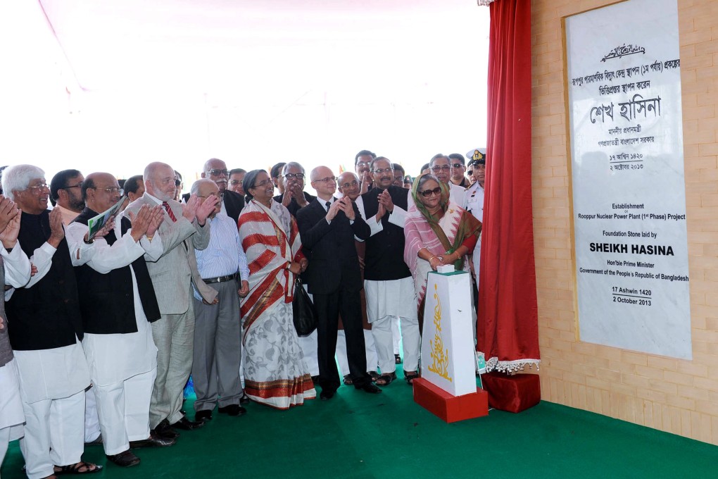 Bangladesh Prime Minister Sheikh Hasina Wajed (right) inaugurates the opening phase of the 2000 megawatt nuclear power plant project. Photo: AFP