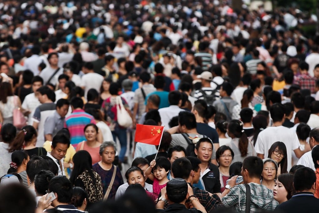 Tourists crowd Nanjing Road in Shanghai. Photo: Imaginechina