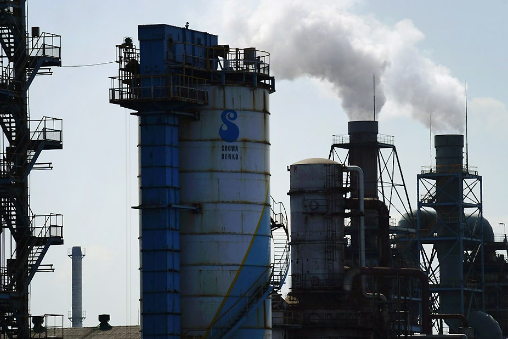 The quarterly tankan index for big manufacturers rose to 12 last month from four in June. Photo: Bloomberg